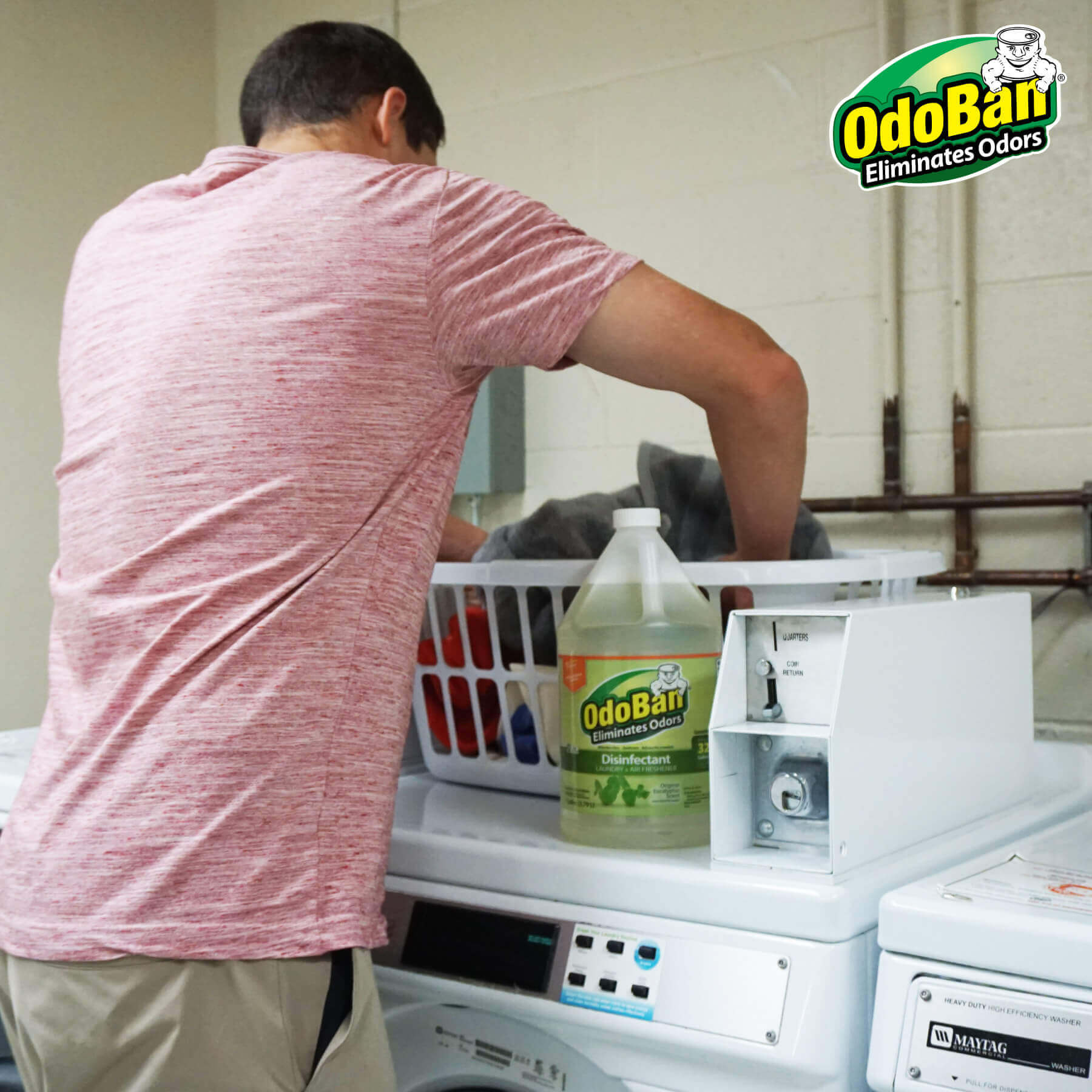 Man doing laundry with OdoBan Concentrate.